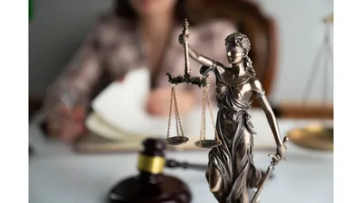 image of lady justice holding justice scales